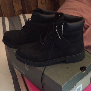 All black timberlands. Only worn once!